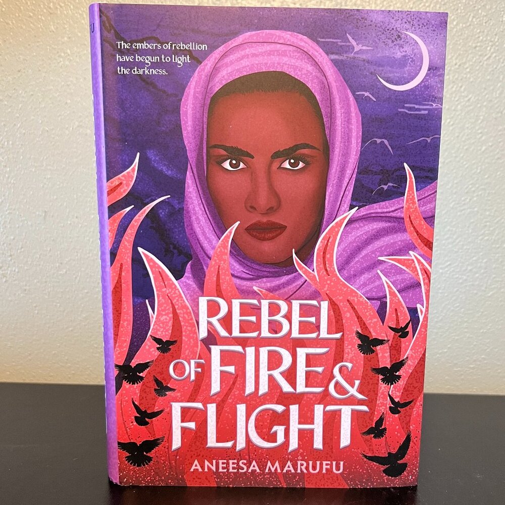 Rebel of Fire and Flight YA Fantasy Hardcover Book Anneesa Marufu Scholastic